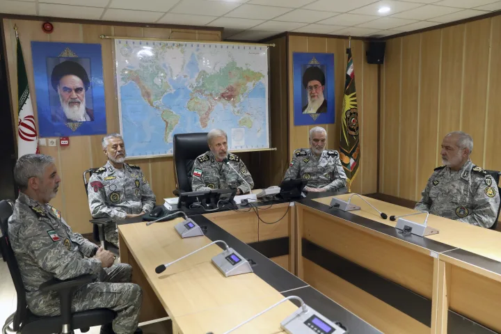 Israel targets Iran’s government and a key Tehran prison as Iran launches more attacks on Israel
