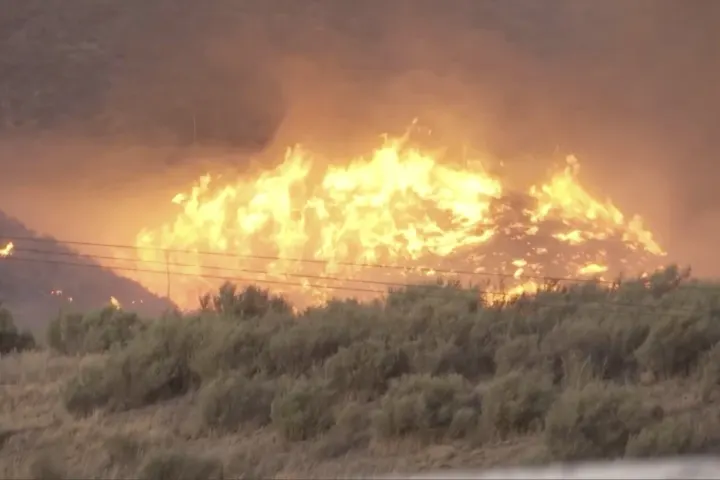 California's largest blaze explodes in size as dry, hot weather raises wildfire risk statewide