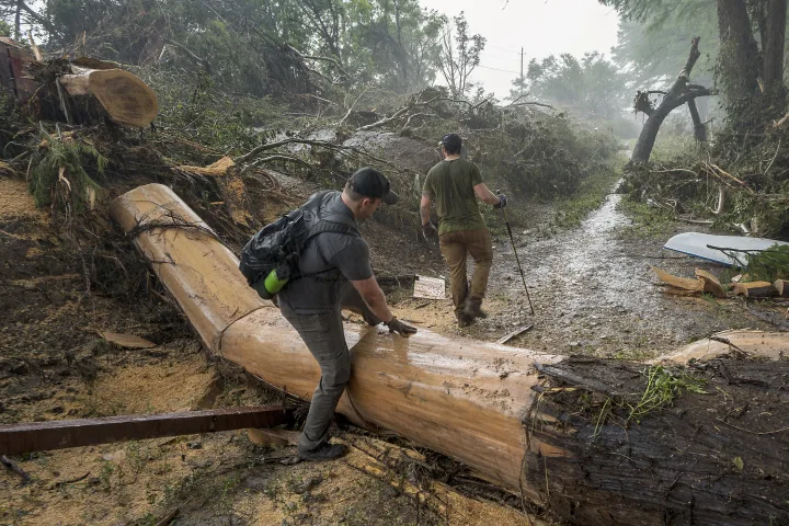 Volunteers flock to help search efforts after Texas floods even as officials warn them away