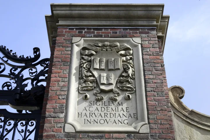 Trump administration moves to cut $100 million in federal contracts for Harvard