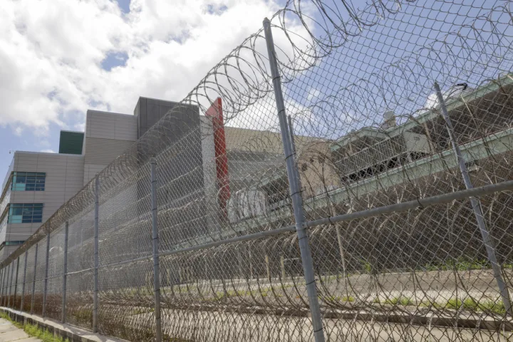 New Orleans jail worker thought he was unclogging a toilet, not helping 10 escape, lawyer says