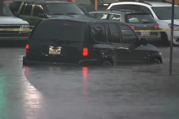 2 dead in New Jersey after flood waters carry away vehicle during heavy rains that hit Northeast
